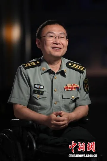 轮椅上的“飞驰人生”